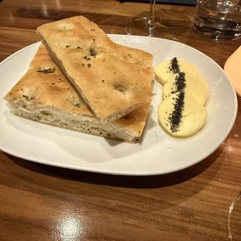 Gordon Ramsay Steak - Focaccia with butter and volcanic salt - Steakhouses Near Me - North Kansas City, Missouri Gordon Ramsay Steak - Focaccia with butter and volcanic salt - Steakhouses Near Me - North Kansas City, Missouri