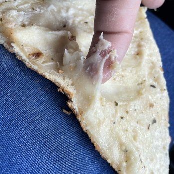 Li'l Nick's Pizza - Raw Pizza dough bellow a Casper pizza - Italian Near Me - Wheat Ridge, Colorado