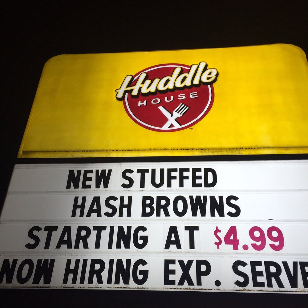 a sign for the new stuffed hash browns starting at $ 499 now hiring exp service a sign for the new stuffed hash browns starting at $ 499 now hiring exp service