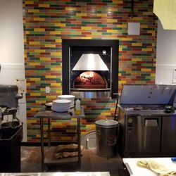 Rotten Johnny's Wood-Fired Pizza Pie - Oven hard at work