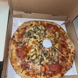 Jet's Pizza - This is unacceptable..this pizza is from jets in st.clair. this pizza is as ugly as the cashiers attitude who sold it to me