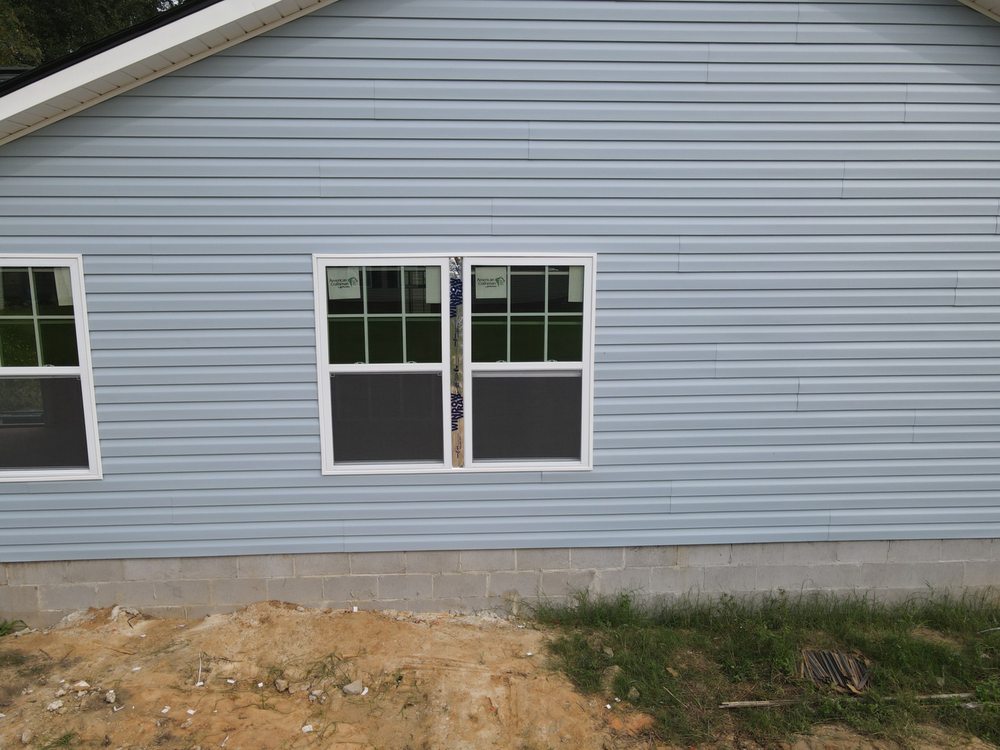 Slide of Helen’s Vinyl Siding and Roofing