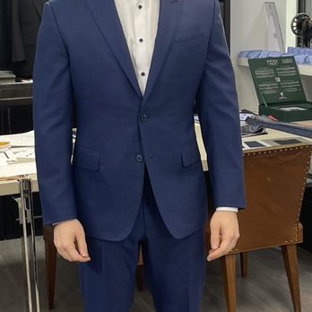 Silvano  Tailoring  - A client picking up his custom suit . - Sewing & Alterations Near Me - New York, New York