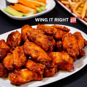 Wing Boss - a plate of chicken wings and french fries - Food Delivery Services Near Me - Norman, Oklahoma