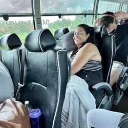Red Coach - My mom relaxing on the bus ride