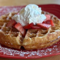 River Daze Cafe - Sourdough waffle with fresh strawberries and whipped cream