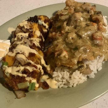 Klondyke - Cajun fish over rice and potato skins - Fast Food Near Me - Vicksburg, Mississippi
