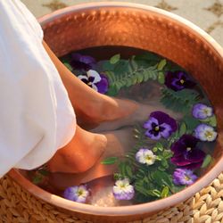 Experience a relaxing polish pedicure with our copper bowls