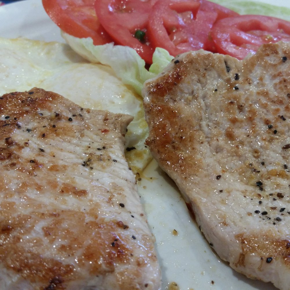 Beach Break Cafe - Juicy pork tenderloin. Brined and cooked to perfection. - Breakfast & Brunch Near Me - Oceanside, California Beach Break Cafe - Juicy pork tenderloin. Brined and cooked to perfection. - Breakfast & Brunch Near Me - Oceanside, California