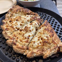 Artichoke hearts, fresh mushrooms and Italian sausage calzone Artichoke hearts, fresh mushrooms and Italian sausage calzone