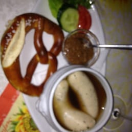 White sausage soup with pretzel. White sausage soup with pretzel.