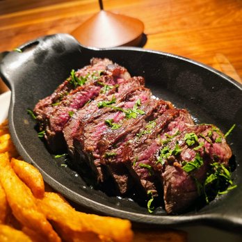 Tallow Steakhouse - $49 Special: 10 oz picanha with fries and au poivre. Good steak/needed sear. Ok fries. Very different au poivre - Wine Bars Near Me - New York, New York
