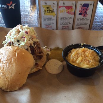 Mission BBQ - Pulled pork sandwich, Carolina style with a side of mac and cheese. A few sauce choices in the background. - Southern Near Me - Charlottesville, Virginia Mission BBQ - Pulled pork sandwich, Carolina style with a side of mac and cheese. A few sauce choices in the background. - Southern Near Me - Charlottesville, Virginia