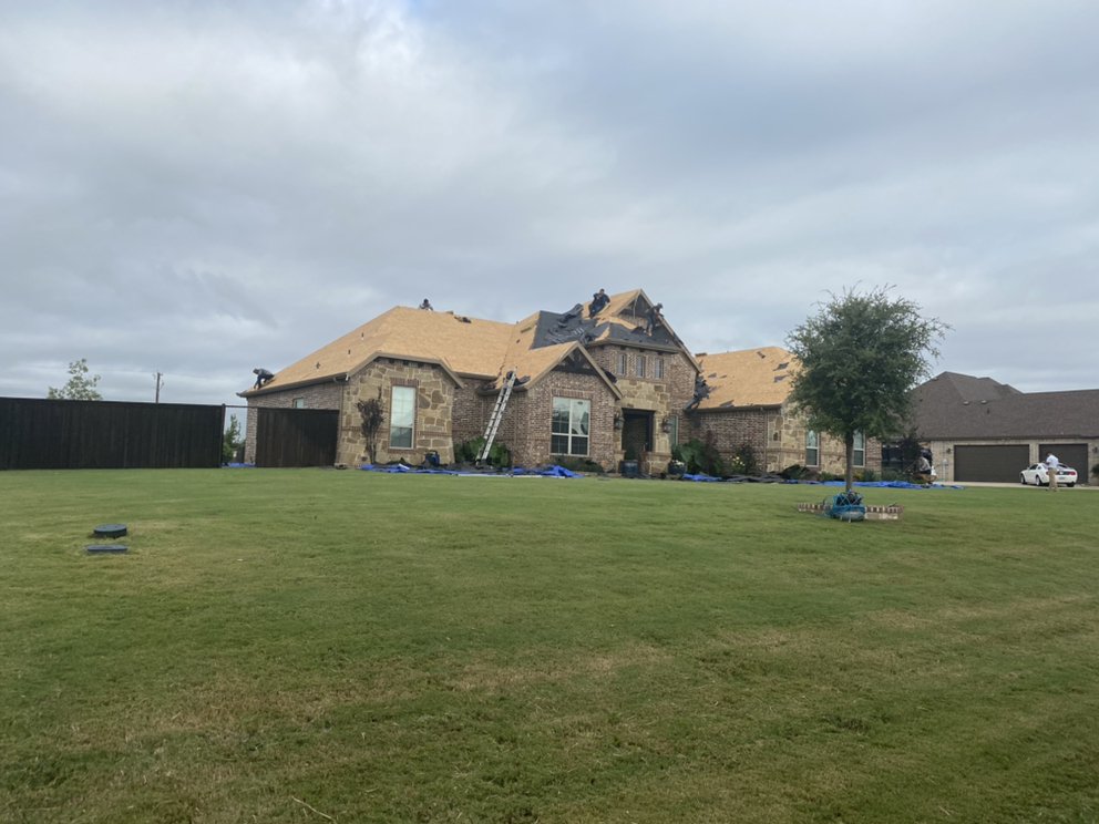 Slide of Freedom Roofing & Construction