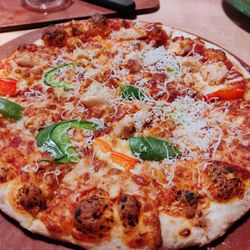 East Side Mario's - Two toppings pizza (grilled chicken and mixed peppers) $14.99 from the lunch menu (comes with soup, salad or fries)