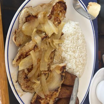 The Cuban Cafe Restaurant - Flatten Chicken with onions.  It also comes with black beans not in picture. À la Plancha - Cafes Near Me - Boca Raton, Florida