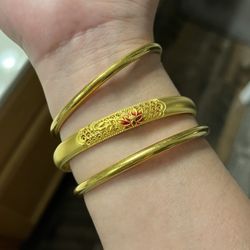 Lukfook Jewellery - Lotus Bangle (middle), special order from Hong Kong took 2-3 months; love it