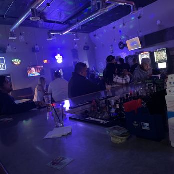 Lucky Johns Kitchen and Cocktails - people sitting at the bar - Cocktail Bars Near Me - Stanton, California