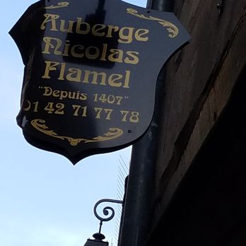 Auberge Nicolas Flamel - Look up to see the sign fire the restaurant - French Near Me - Paris, 75 Auberge Nicolas Flamel - Look up to see the sign fire the restaurant - French Near Me - Paris, 75