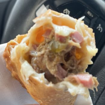 1928 Cuban Bistro - Fleming Island - Cuban Empanada. Swiss cheese, Ham, pork, pickle, mustard. Very yummy. - Coffee & Tea Near Me - Fleming Island, Florida