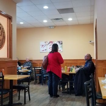 Great Wok - two people sitting at tables in a restaurant - Chinese Near Me - Dundee, Michigan Great Wok - two people sitting at tables in a restaurant - Chinese Near Me - Dundee, Michigan