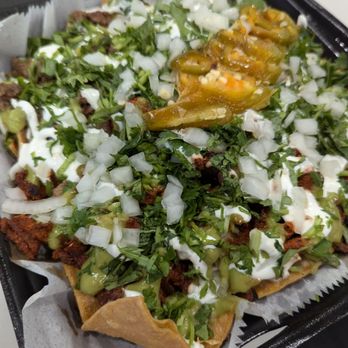 Tacos Tapatio - Nachos with half carne asada half al pastor. - Tacos Near Me - Mesa, Arizona