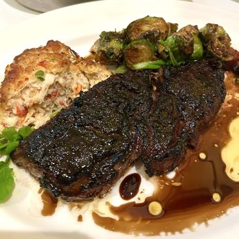 The Capital Grille - Porcini Porcini-Rubbed Bone-In Ribeye with 15-Year Aged Balsamic, Lobster and Crab Cake and Soy Glazed Brussels Sprouts with Bacon - Steakhouses Near Me - Philadelphia, Pennsylvania The Capital Grille - Porcini Porcini-Rubbed Bone-In Ribeye with 15-Year Aged Balsamic, Lobster and Crab Cake and Soy Glazed Brussels Sprouts with Bacon - Steakhouses Near Me - Philadelphia, Pennsylvania