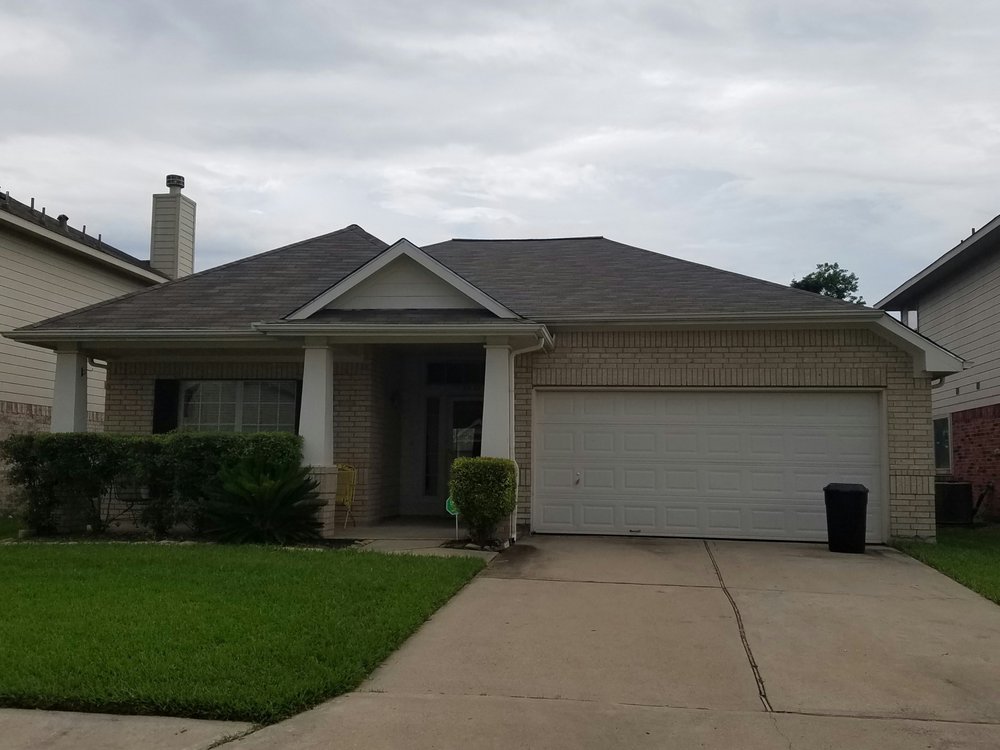 Slide of Houston Roofing Experts