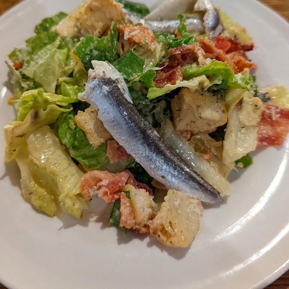 Chuck's Steakhouse - Table-side Caesar salad with white anchovies - Steakhouses Near Me - Banff, Alberta