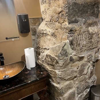 Cozy Cafe And Bakery - Exposed stone wall in the bathroom! - Cafes Near Me - Ellicott City, Maryland Cozy Cafe And Bakery - Exposed stone wall in the bathroom! - Cafes Near Me - Ellicott City, Maryland