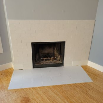 Dm Construction Group - Gorgeous re-tiled fireplace. - General Contractors Near Me - Maple Valley, Washington