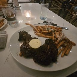 Ribeye steak dinner- sub potato for parm fries and mushrooms for a ceasar salad Ribeye steak dinner- sub potato for parm fries and mushrooms for a ceasar salad