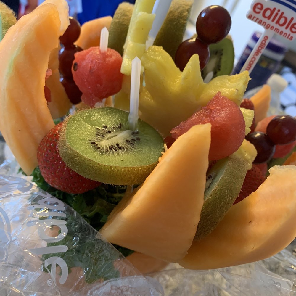 Edible Arrangements - a fruit arrangement with candles - Florists Near Me - Kenosha, Wisconsin