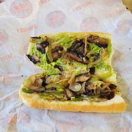 Sparsely filled Meatless Mushroom sandwich