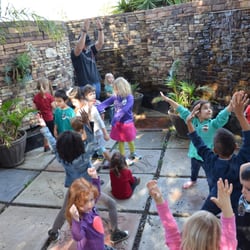 Chase Ranch Montessori School - Yoga time at Victoria's garden area.