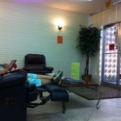 Roy Nakaiye, DDS - Cedar Pearl Dentistry - Leather lounge couches in waiting room...umm yes