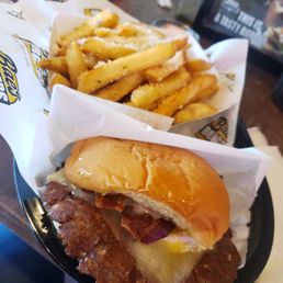 G.B.B. with fried egg and garlic parm fries G.B.B. with fried egg and garlic parm fries