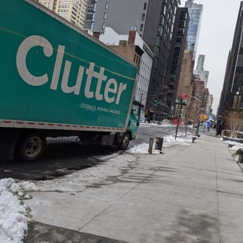 Clutter Storage - Can't miss the bright and well-marked truck when it arrives! - Self Storage Near Me Clutter Storage - Can't miss the bright and well-marked truck when it arrives! - Self Storage Near Me