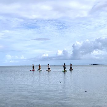 Yoga With A Twyst - Sunrise SUP yoga crew - Yoga Near Me Yoga With A Twyst - Sunrise SUP yoga crew - Yoga Near Me