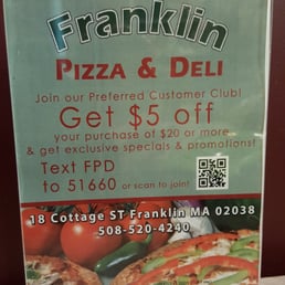 a sign for franklin pizza and deli