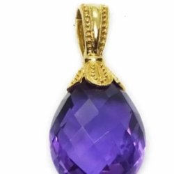 Jewelry Gallery - This is a 5 carat amethyst with 14 karat gold pendant. I received $60 for it.