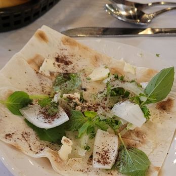 Raffi's Place - Complimentary Lavesh bread. Make sure to season it like this:-) - Middle Eastern Near Me - Glendale, California