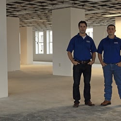 Cove Enterprises - Owner Ken Paradis (left) and his staff ensure high quality for jobs large and small, whether in the private, retail, or government sector.