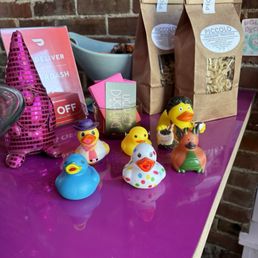 Super cute duck theme and merch area.
