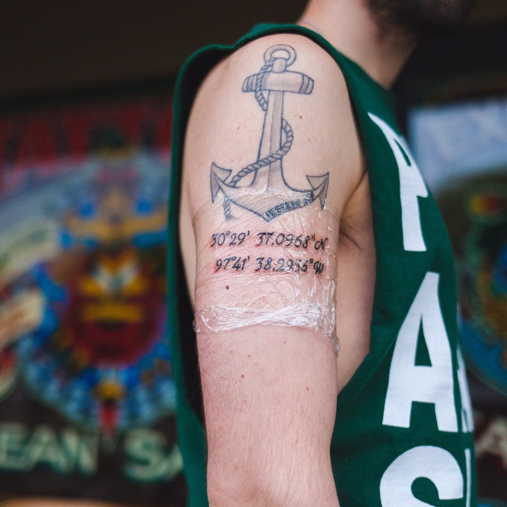 Crystal did the coordinates at the bottom of my pre-existing anchor tattoo. She free-handed it!