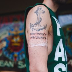 Fortune Bros Tattoo - Crystal did the coordinates at the bottom of my pre-existing anchor tattoo. She free-handed it!