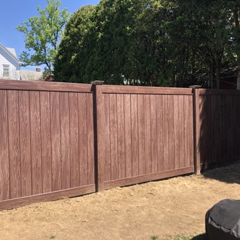 Capital Fence & Construction - a fence in a backyard - Fences & Gates Near Me - Bronxville, New York Capital Fence & Construction - a fence in a backyard - Fences & Gates Near Me - Bronxville, New York