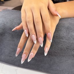 Beautiful gel x cat eye stiletto French nails Beautiful gel x cat eye stiletto French nails
