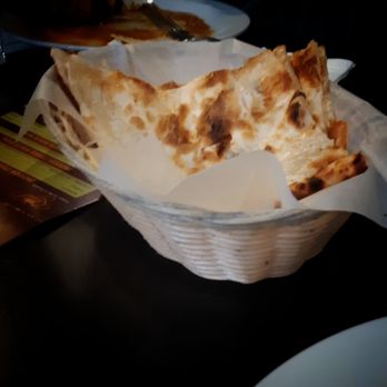 Royal Indian Buffet & Sweets - Na'an served in basket at the table - Indian Near Me - Cambridge, Ontario