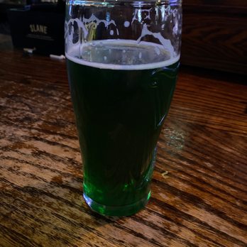 Slainte Irish Pub - a pint of green beer - Pubs Near Me - Wilmington, North Carolina